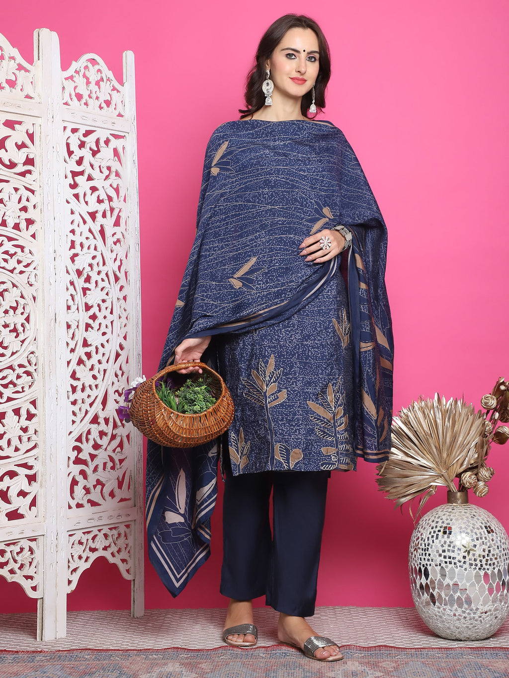 Navy blue muslin kurta with floral print, zari, and crystal work, including trousers and dupatta