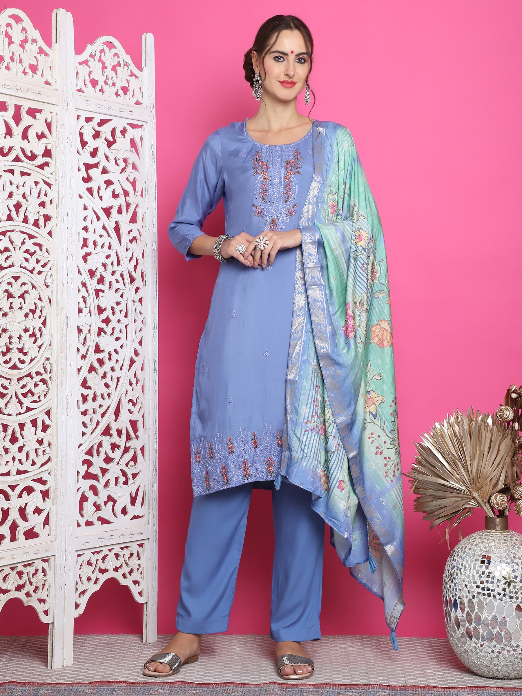 Women's blue muslin floral kurta with Resham embroidery paired with trousers and dupatta