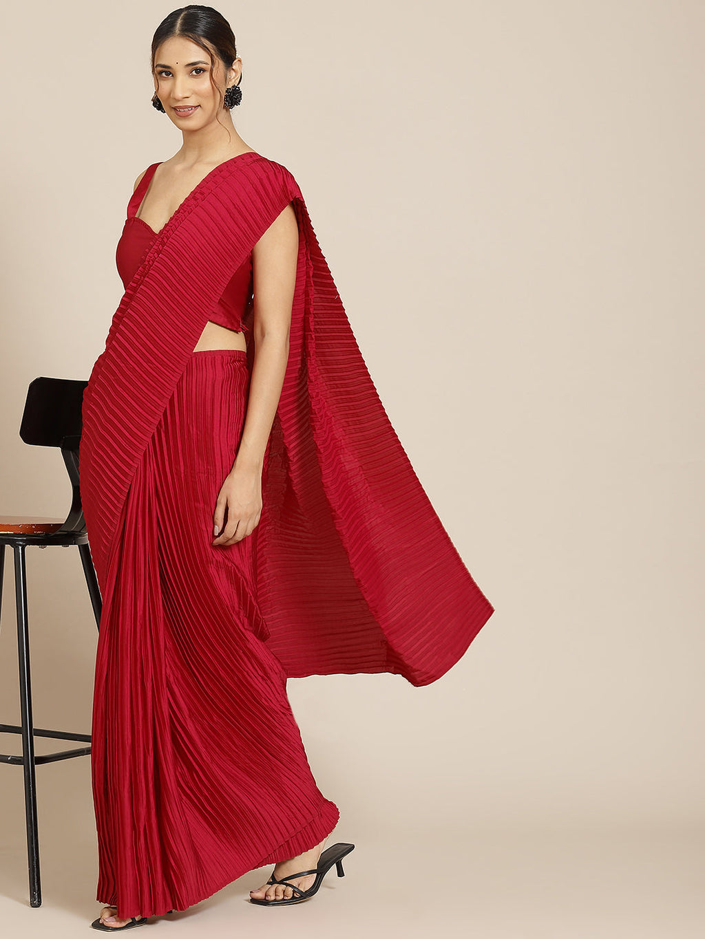 Red satin designer saree with pleated work and matching blouse