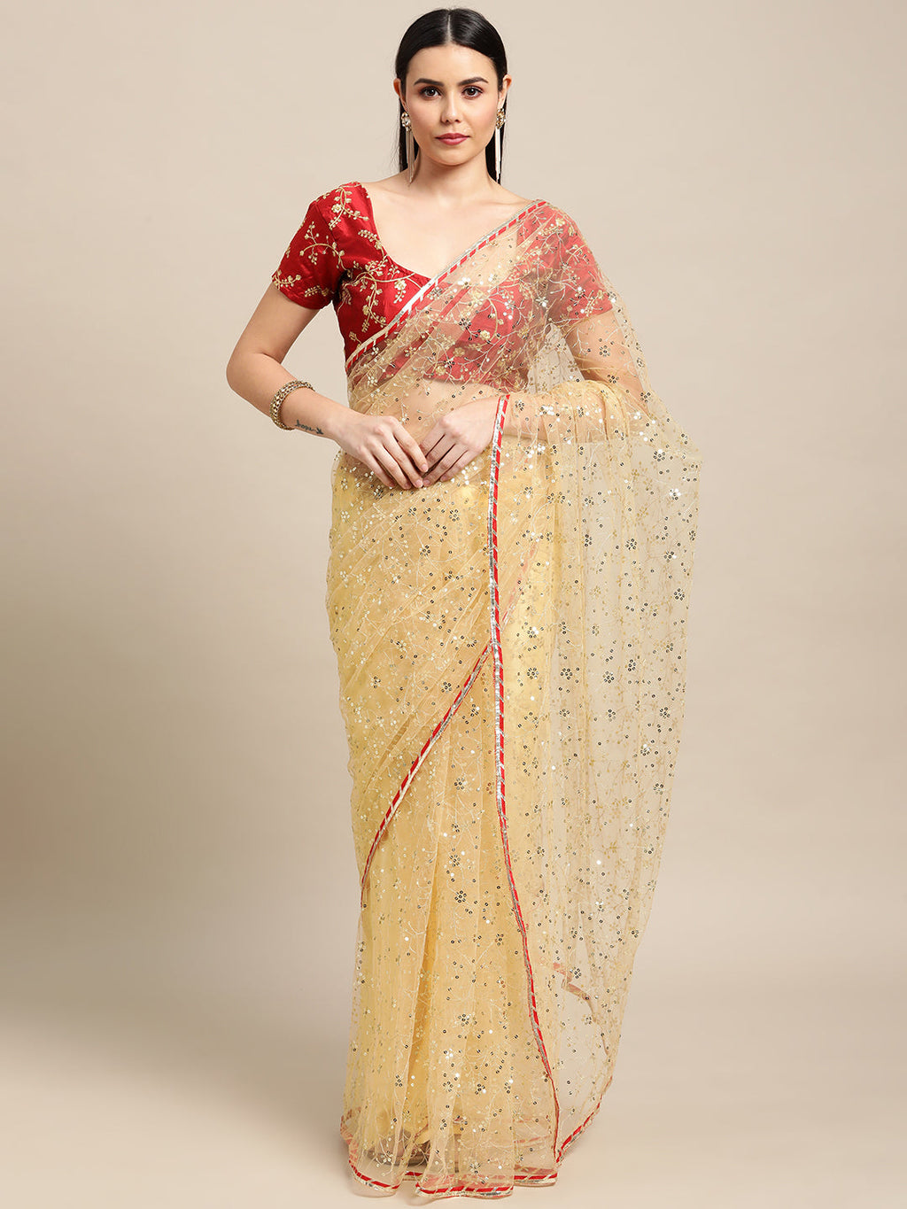 White net designer saree with intricate embroidery and matching blouse