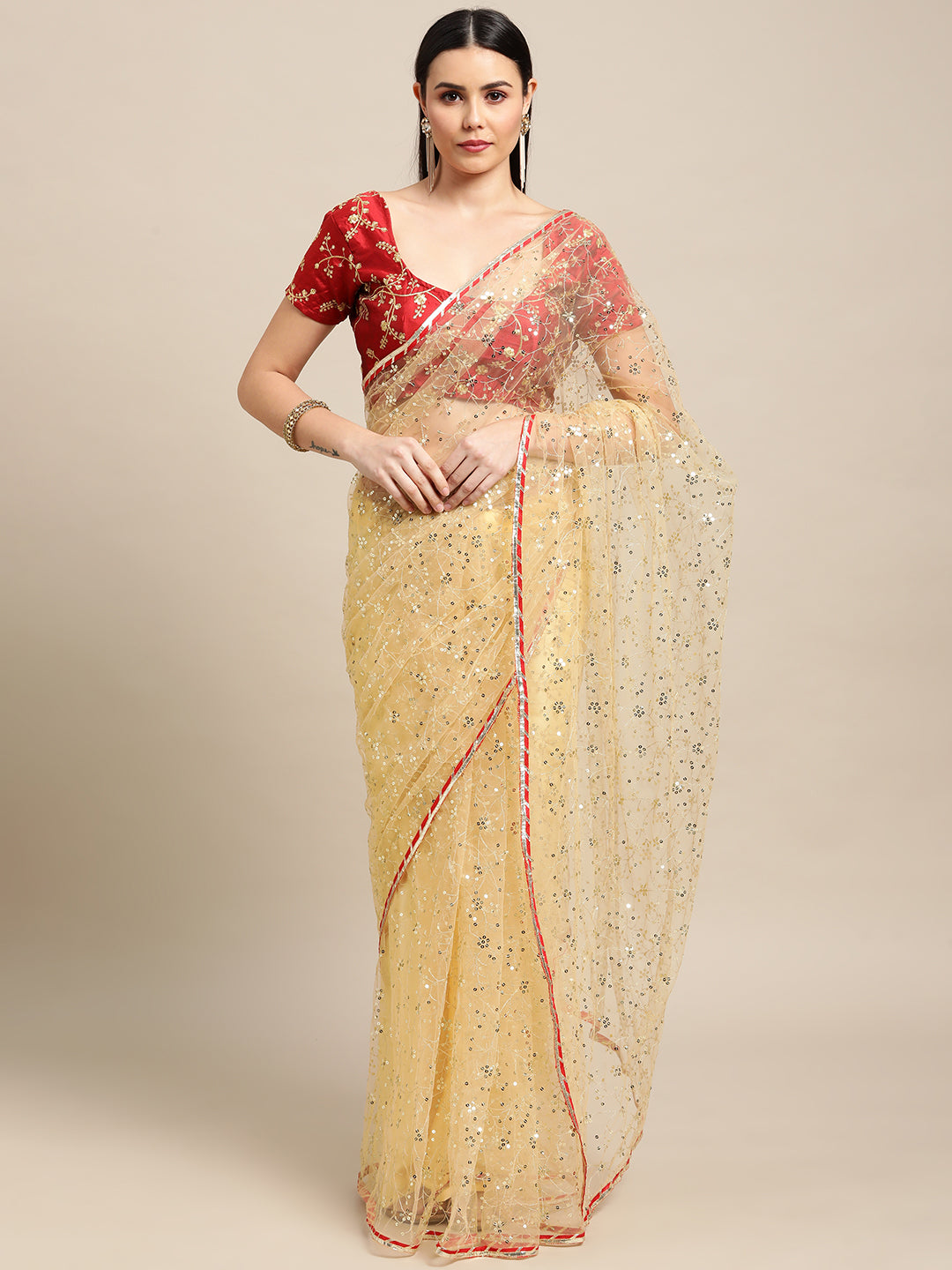 White net designer saree with intricate embroidery and matching blouse