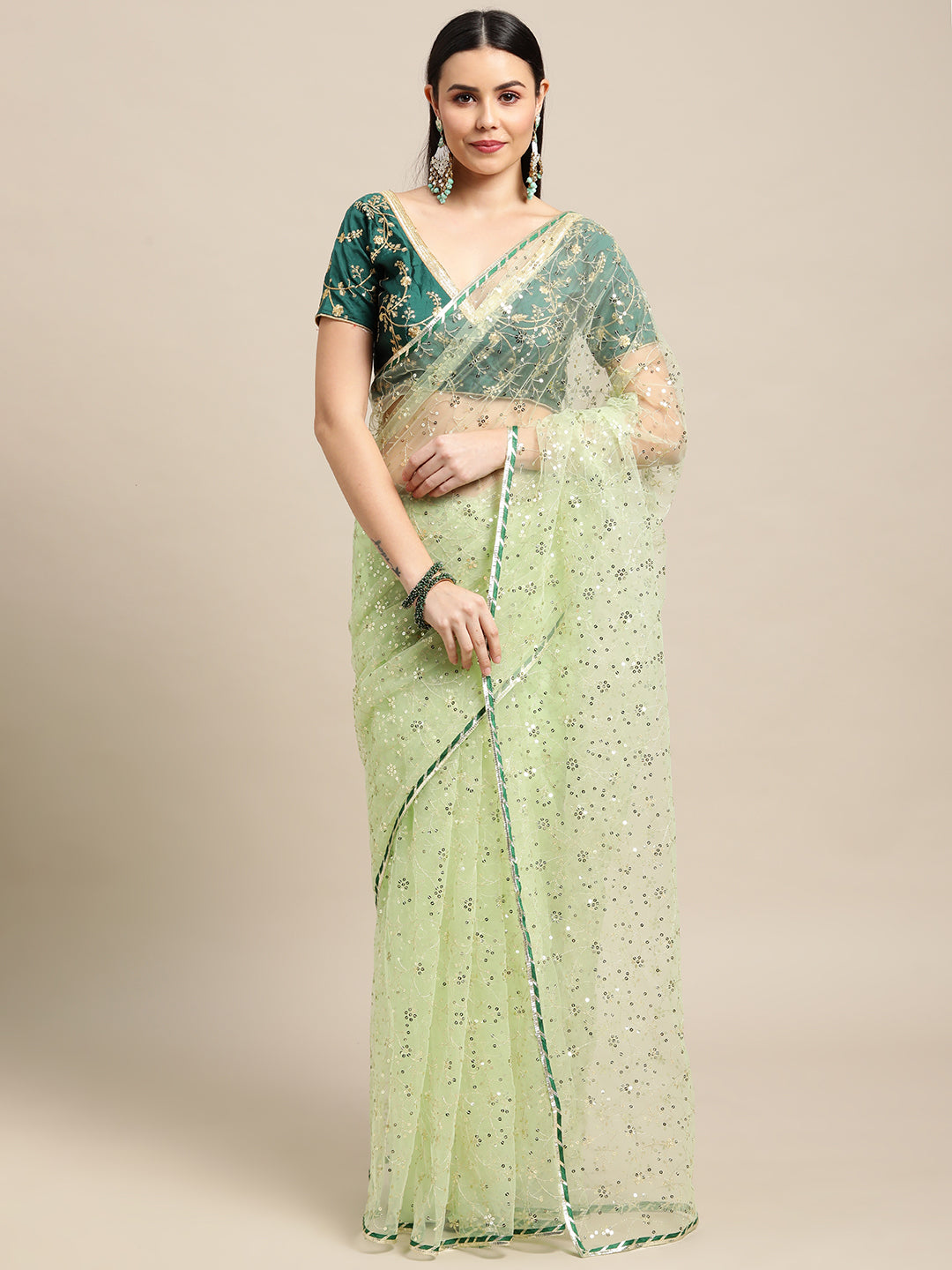 Green net embroidered designer saree with matching blouse