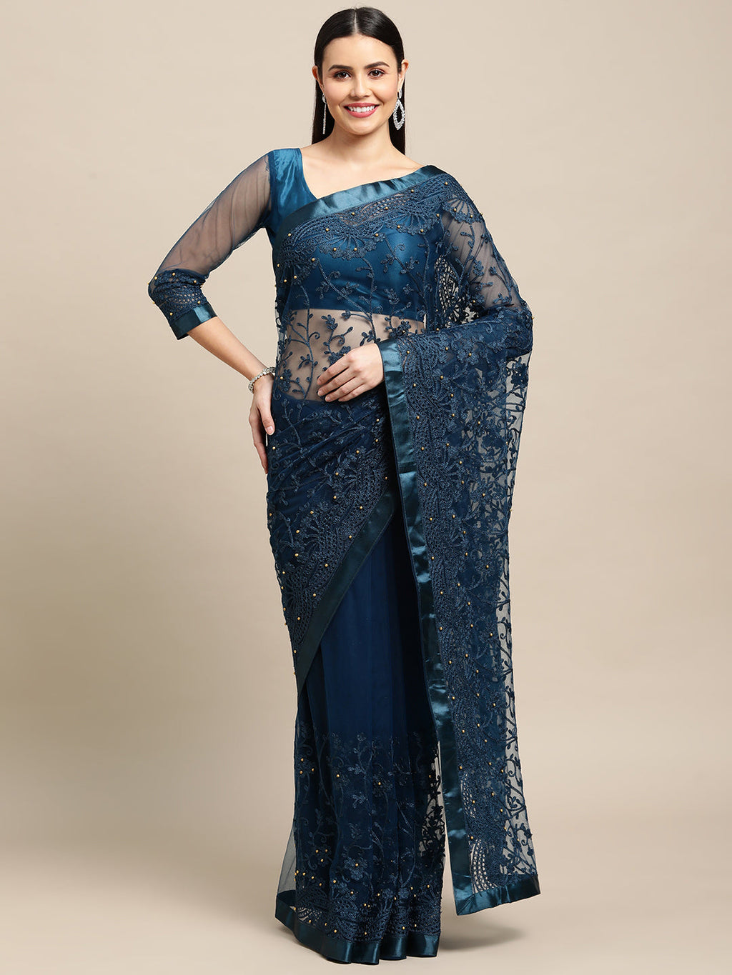 Blue net embroidered designer saree with elegant drape and matching blouse