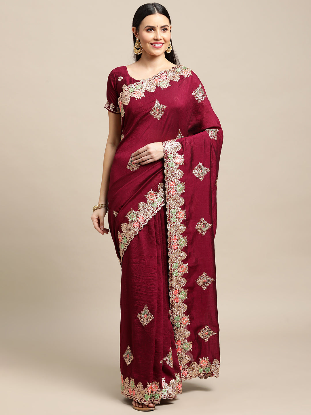Regal purple silk blend designer saree featuring intricate embroidery and matching blouse