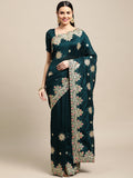 Green silk blend saree with elegant embroidery and matching blouse.