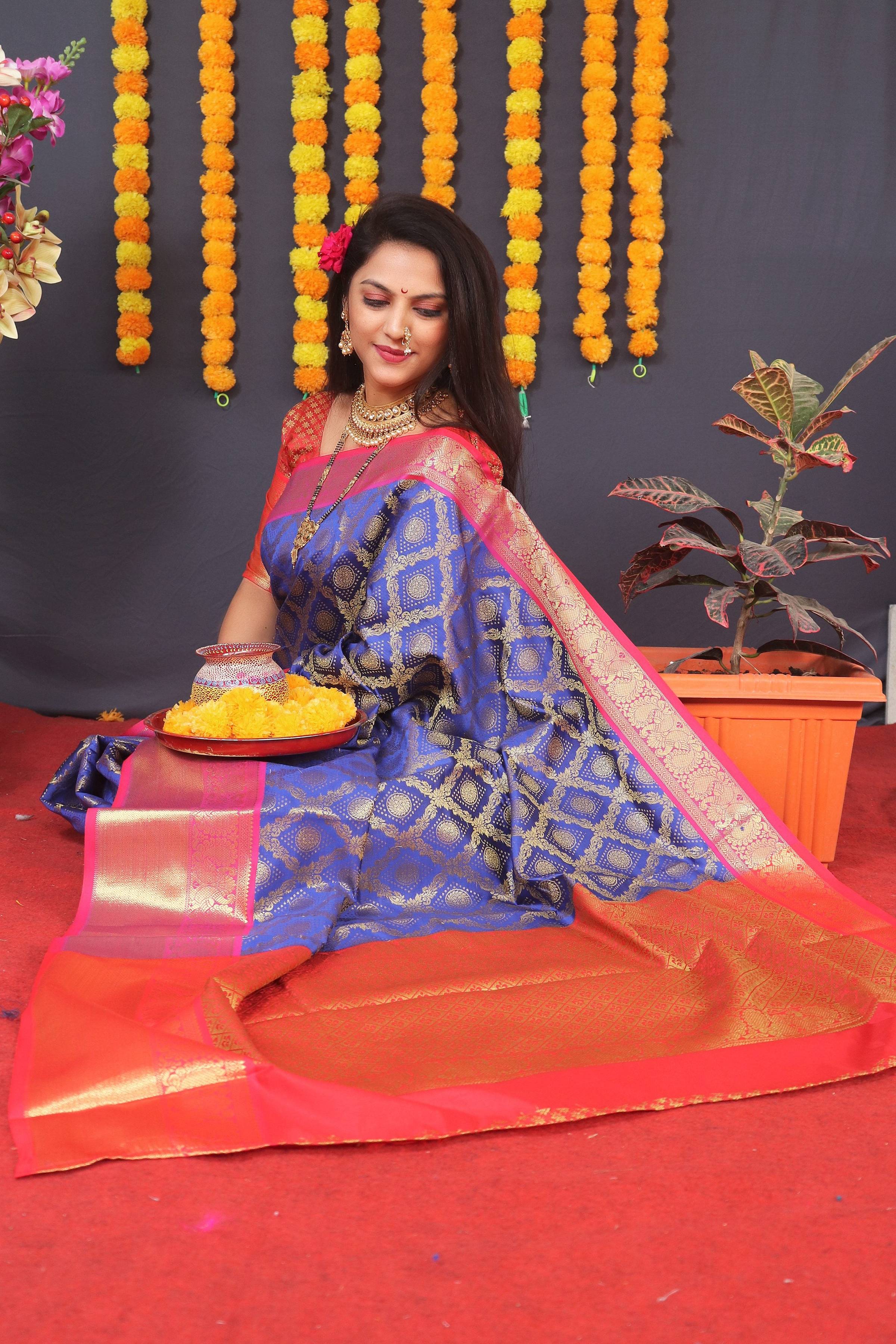 Blue Kanchipuram Silk Zari Woven Saree with Matching Blouse