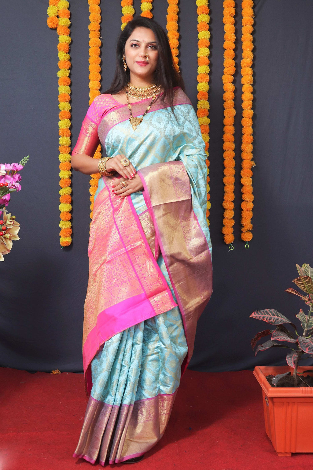 Sky blue Kanchipuram silk saree with metallic zari woven work