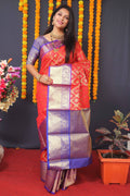 Red Kanchipuram silk saree with intricate Zari work and matching blouse