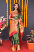 Green Kanchipuram silk saree with elegant Zari work and matching blouse