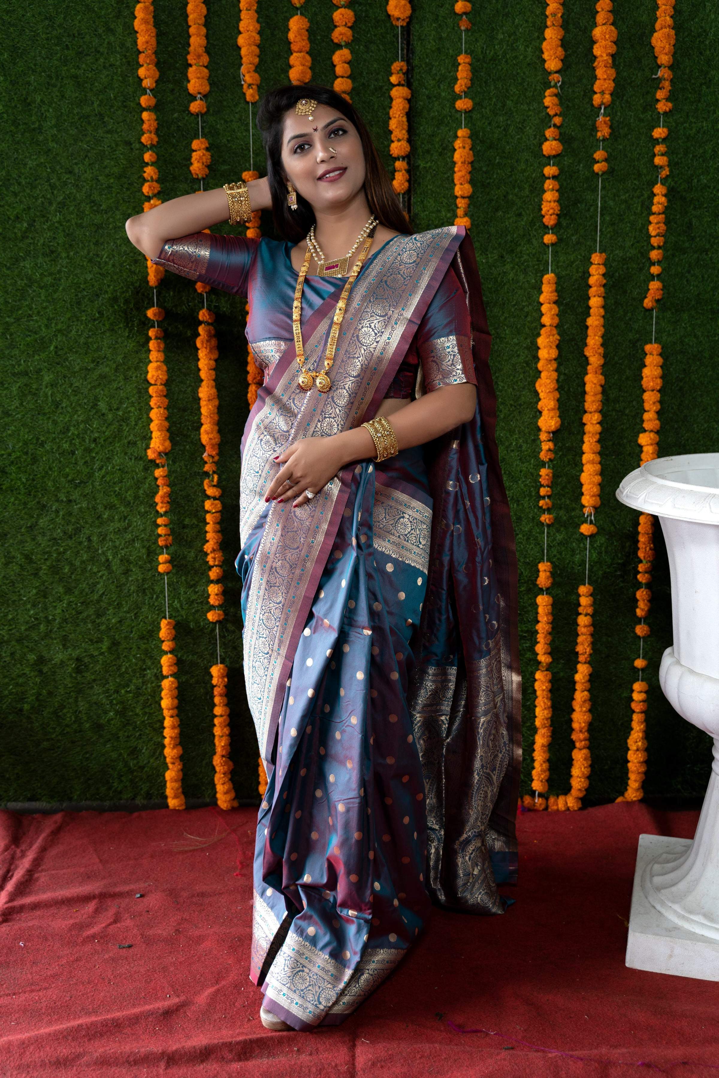Grey handloom Banarasi silk saree with traditional zari woven patterns
