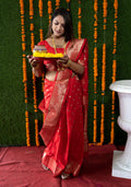 Stunning red handloom Banarasi silk saree with intricate zari woven border and matching blouse