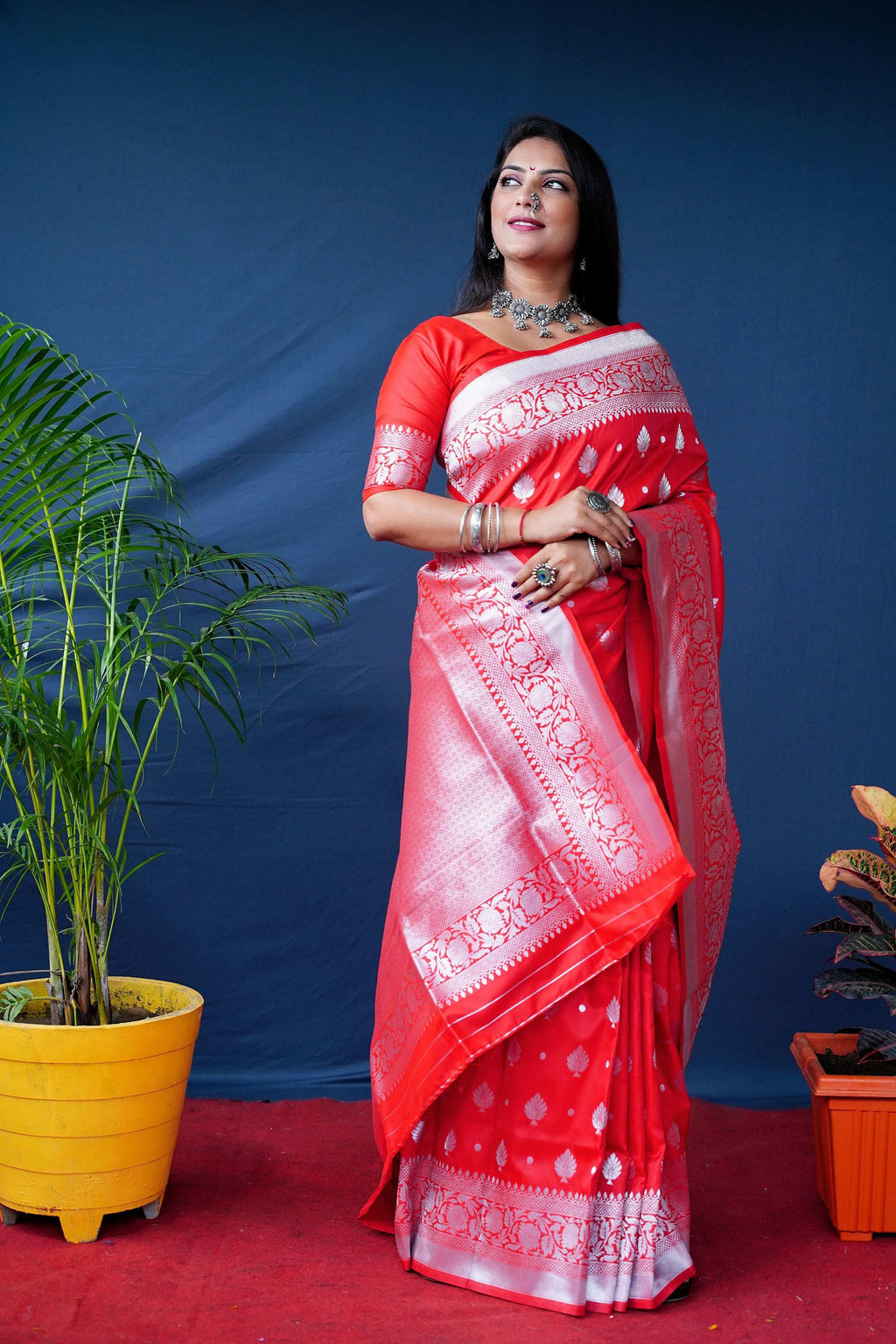 Elegant red soft Banarasi silk saree with gold zari weaving.