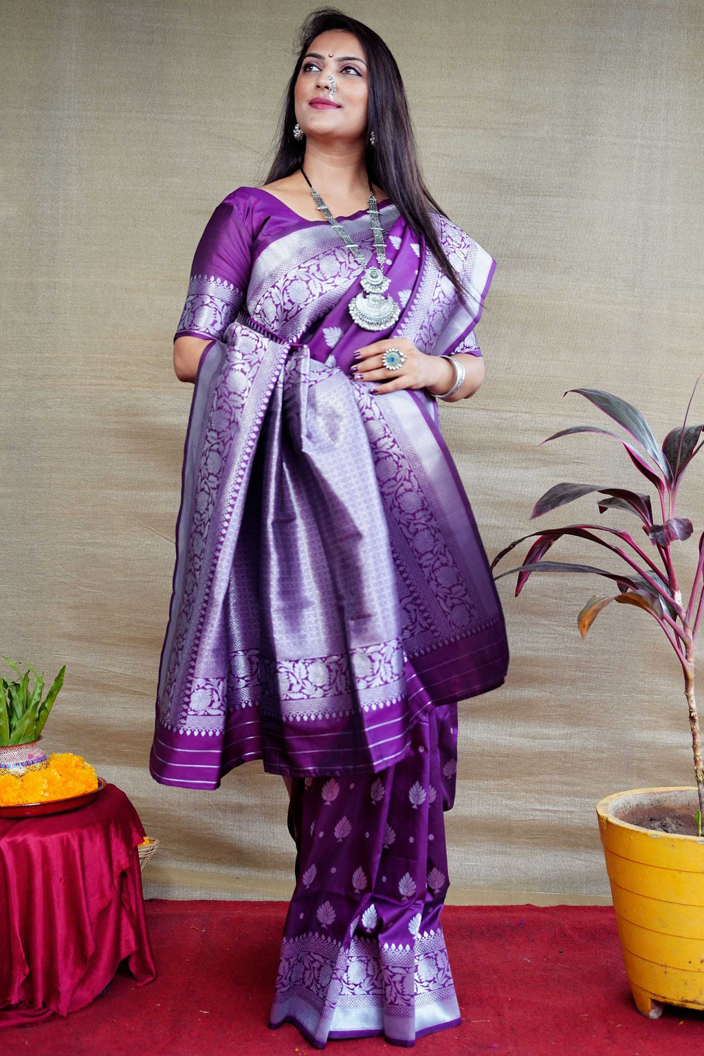 Purple soft Banarasi silk saree featuring Zari woven patterns