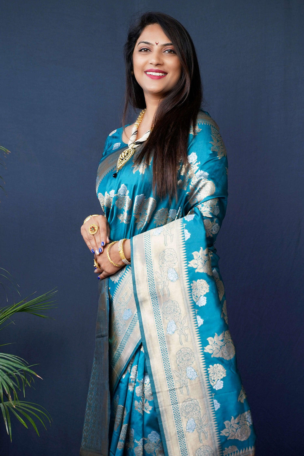 Women's Teal Handloom Banarasi Silk Saree with Zari Details