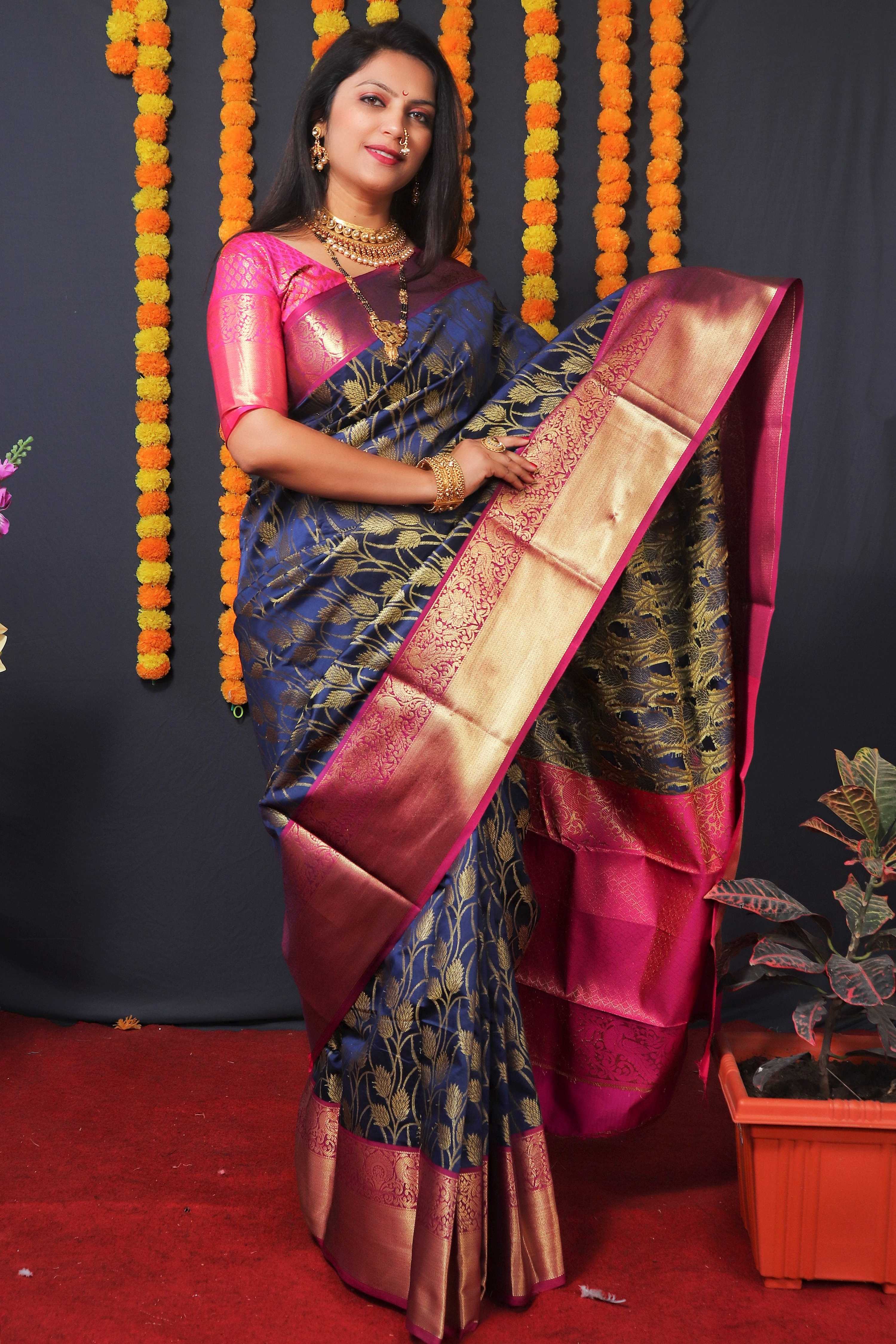 Navy Blue Kanchipuram silk saree with intricate gold zari woven designs