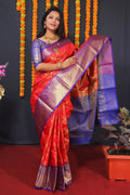 Red Kanchipuram Silk Saree featuring heavy Zari woven detail with a matching blouse