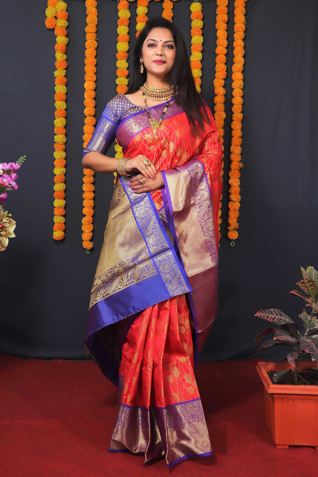 Red Kanchipuram Silk Saree with Zari Woven Detail and Blouse