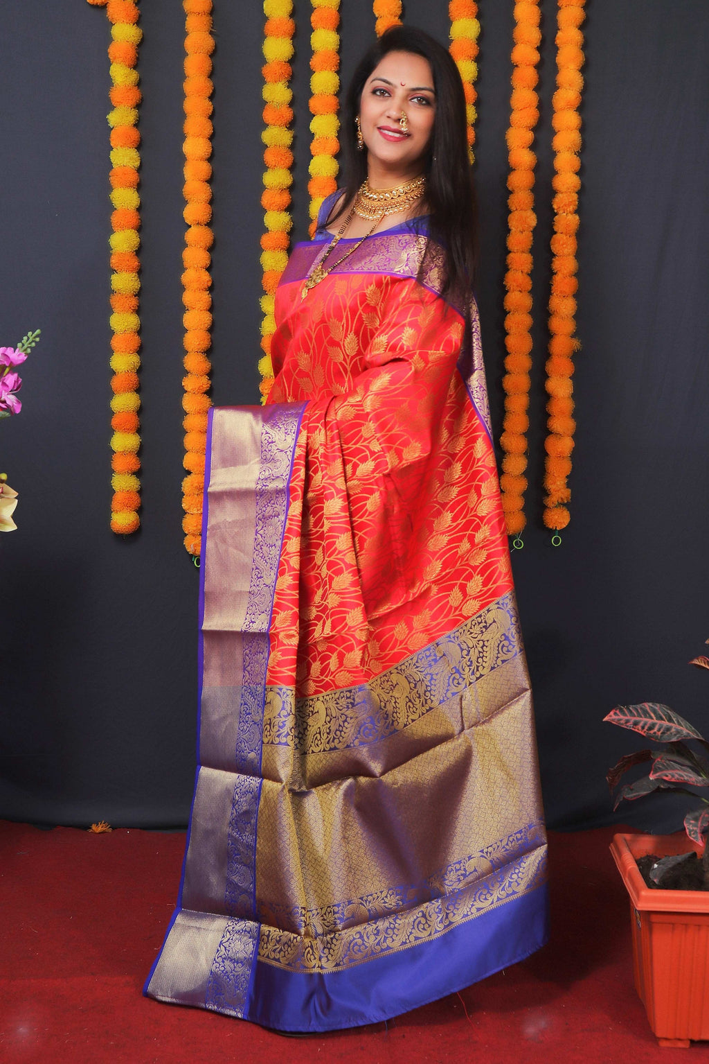 Red Kanchipuram Silk Saree with Zari Woven Detail and Blouse