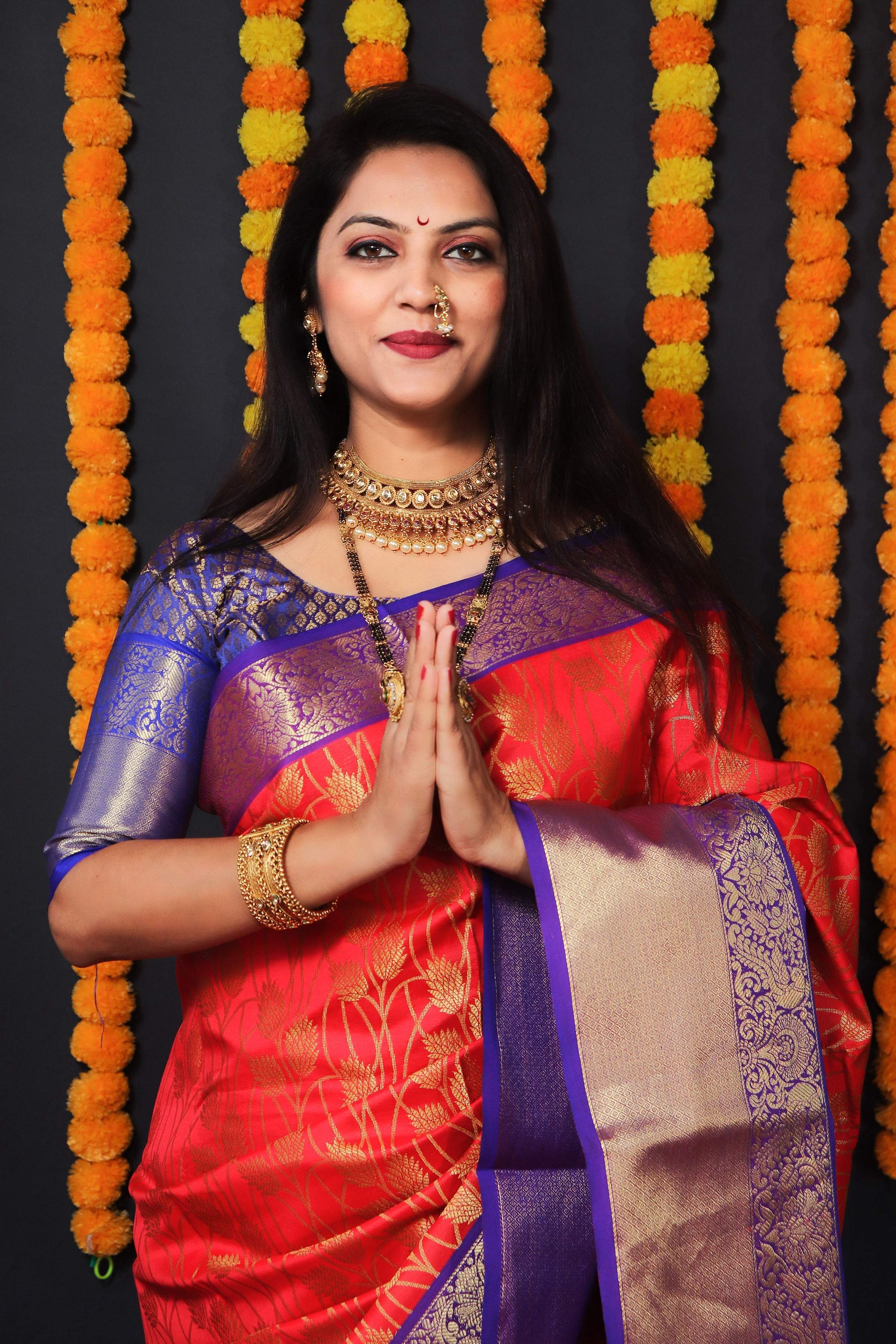 Red Kanchipuram Silk Saree with Zari Woven Detail and Blouse
