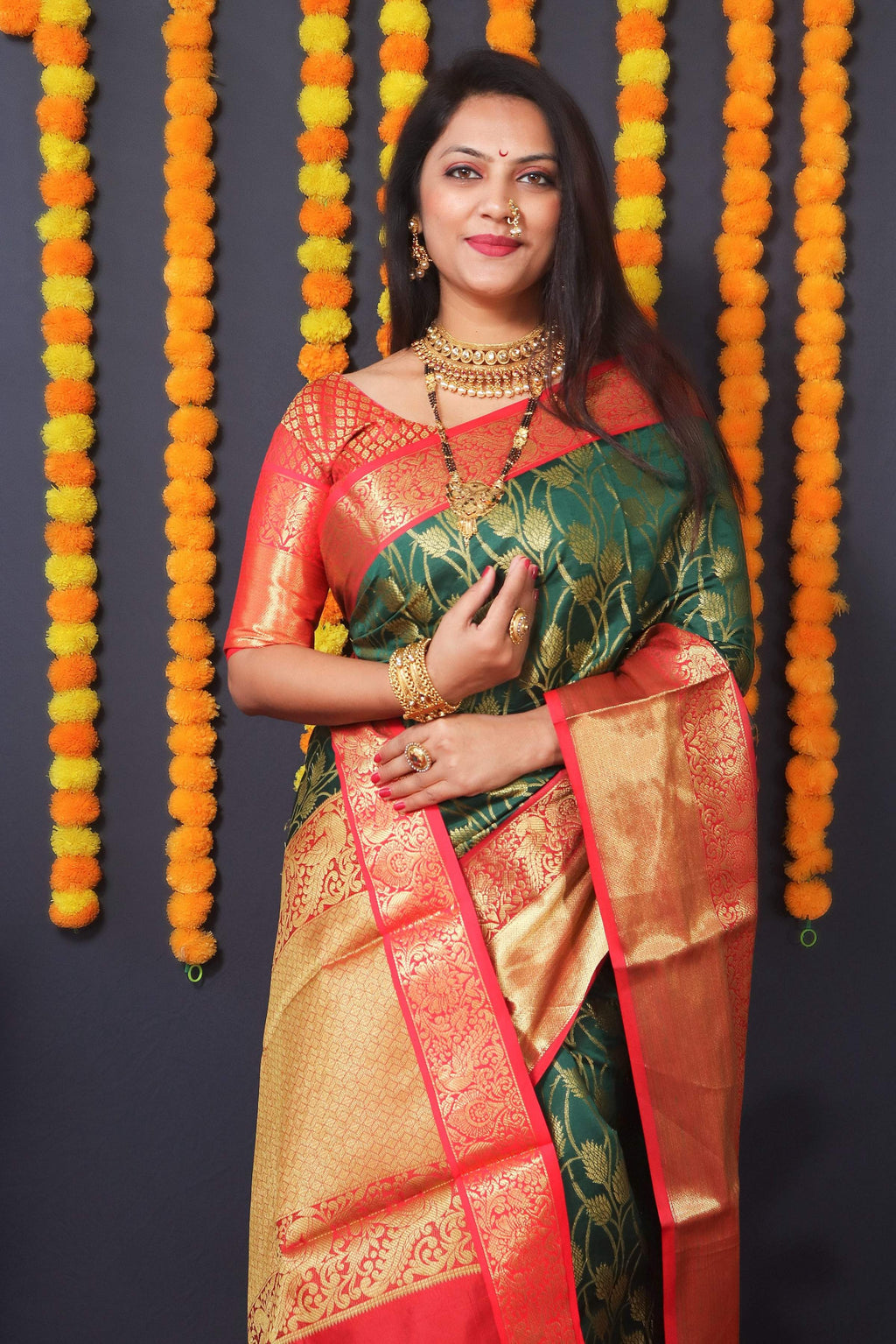 Green Kanchipuram Silk Saree with Zari Woven Details & Blouse