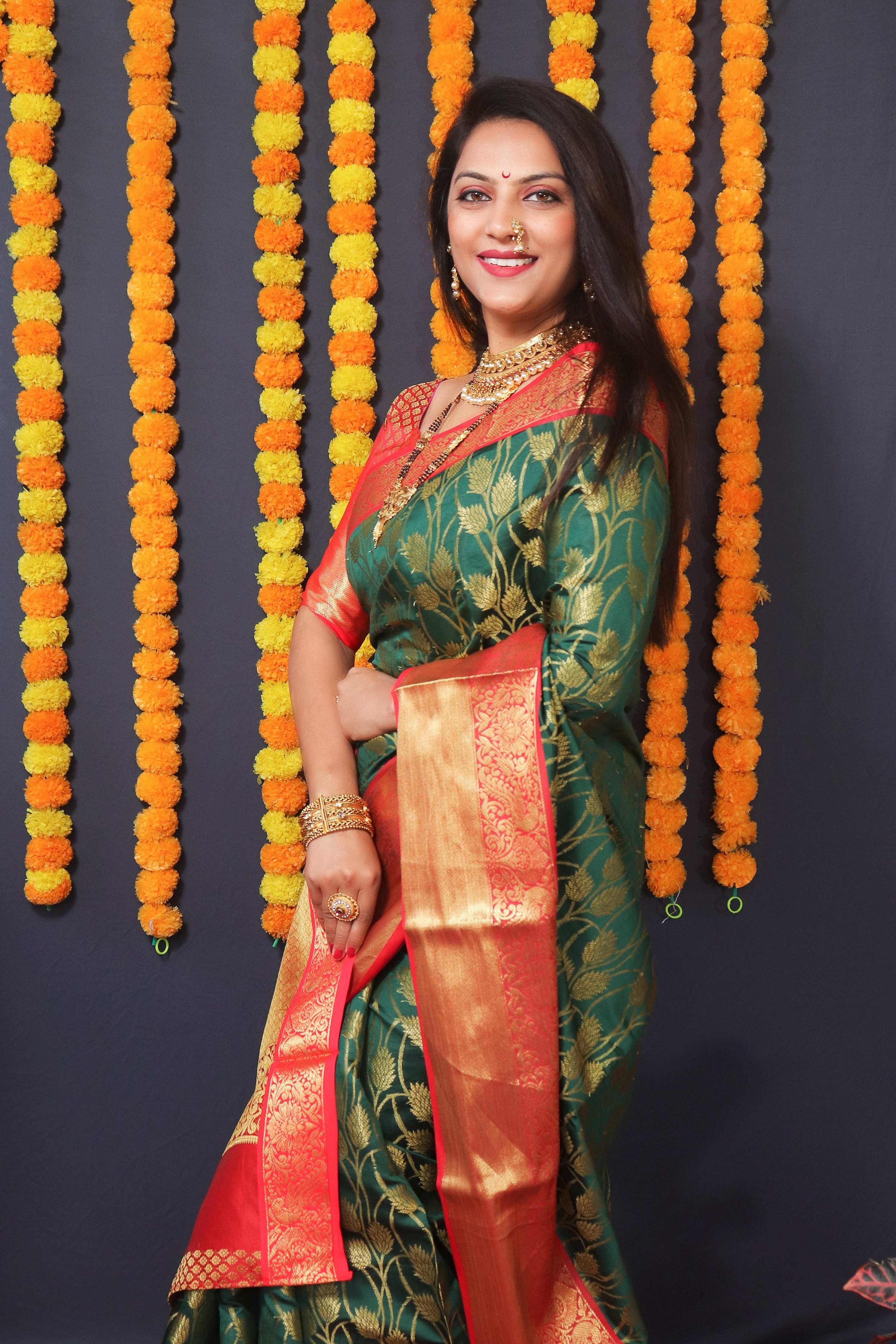 Green Kanchipuram Silk Saree with Zari Woven Details & Blouse