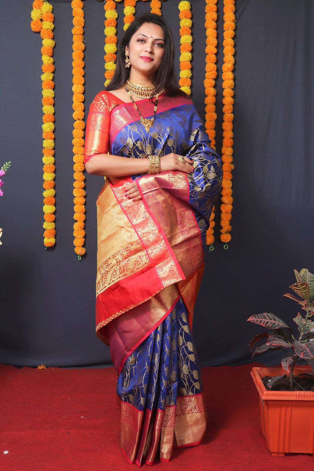Blue Kanchipuram Silk Saree with Zari Woven Motifs and Blouse