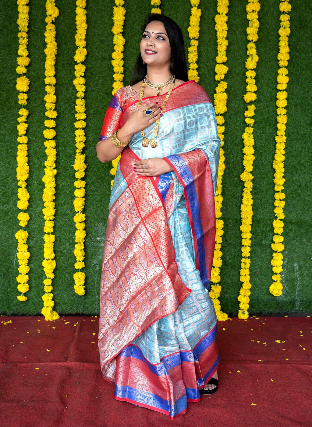 Sky Blue Kanchipuram Silk saree with elegant Zari woven patterns and matching blouse