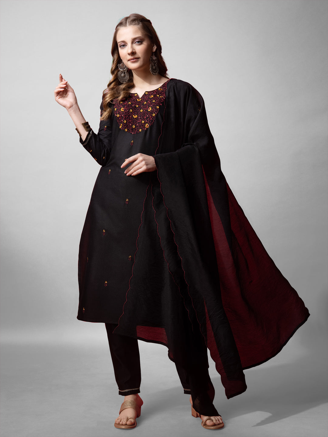 Front view of a black cotton blend straight kurta featuring embroidery details and 3/4 sleeves