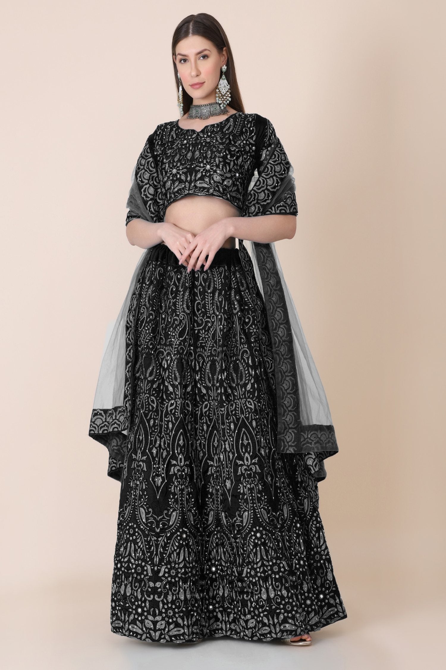 Sophisticated black taffeta silk lehenga choli set with intricate thread embroidery
