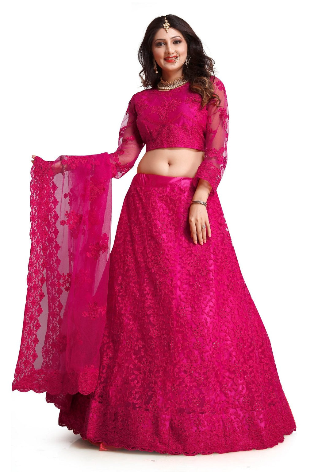 Woman wearing a Dark Pink Net Lehenga Choli set with intricate thread embroidery