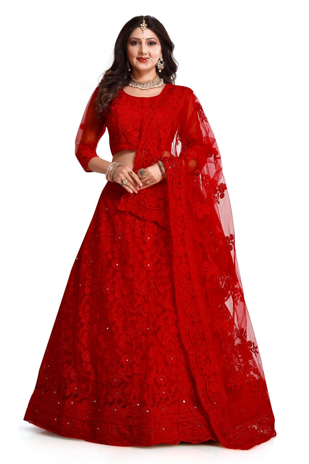 Vibrant red net lehenga choli set with detailed thread embroidery and flowing silhouette.
