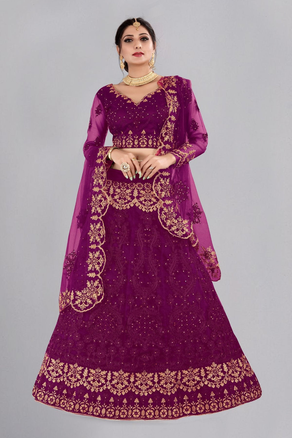 Stunning purple designer lehenga choli set featuring delicate thread embroidery on net.