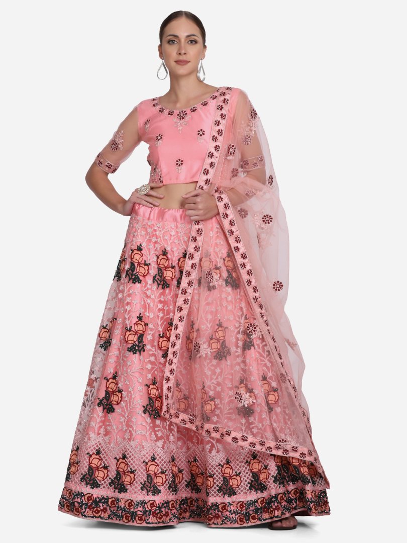 Baby pink net lehenga choli with intricate thread embroidery and full flare for girls.