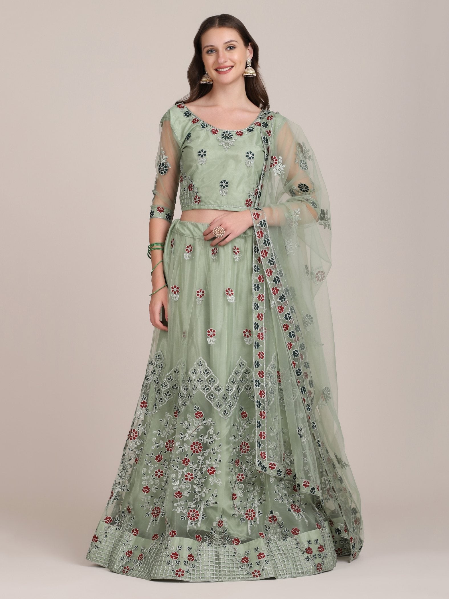 Sea green net lehenga choli with detailed thread embroidery