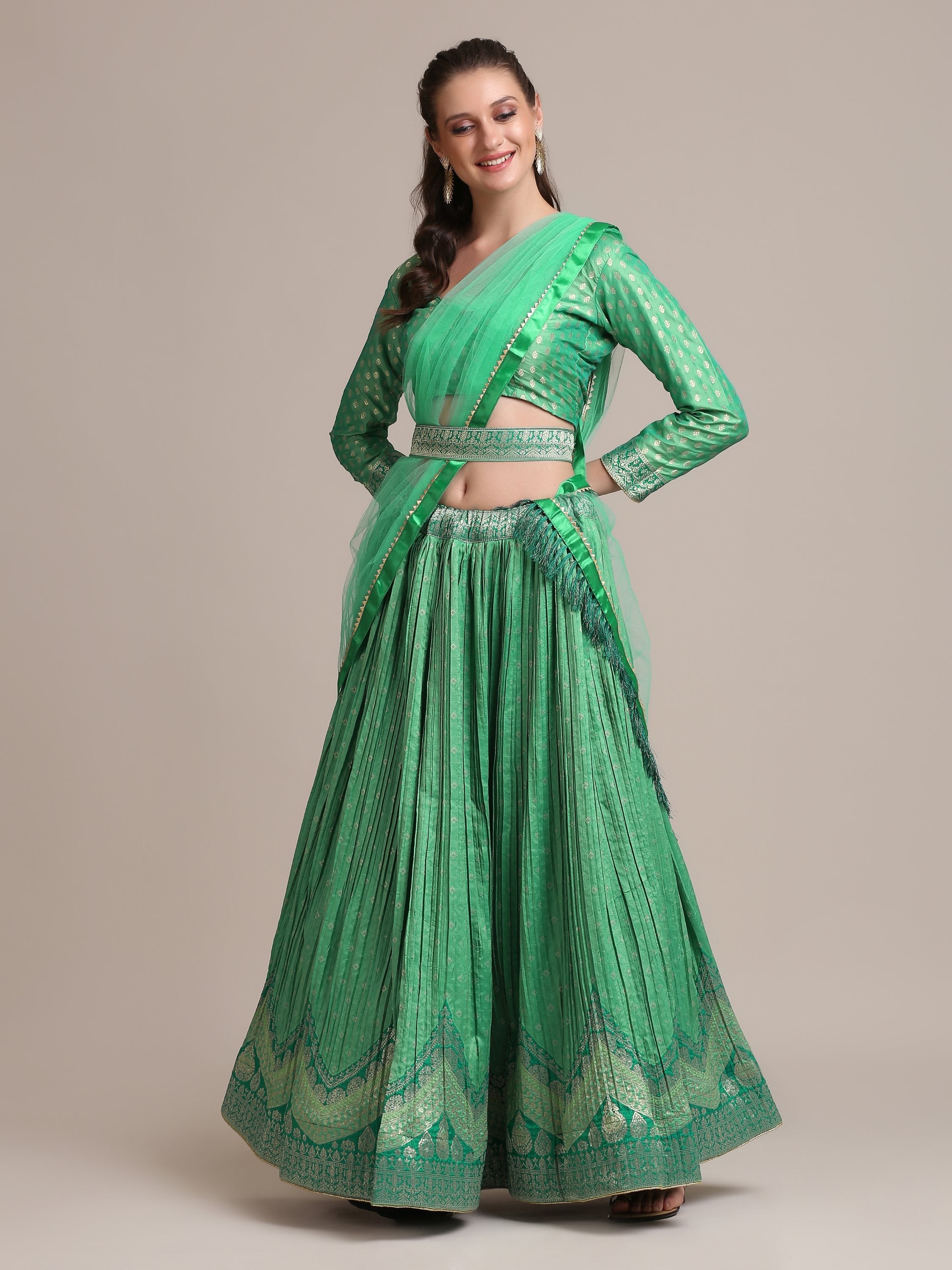 Sea Green Jacquard Silk lehenga with gold woven and platted work