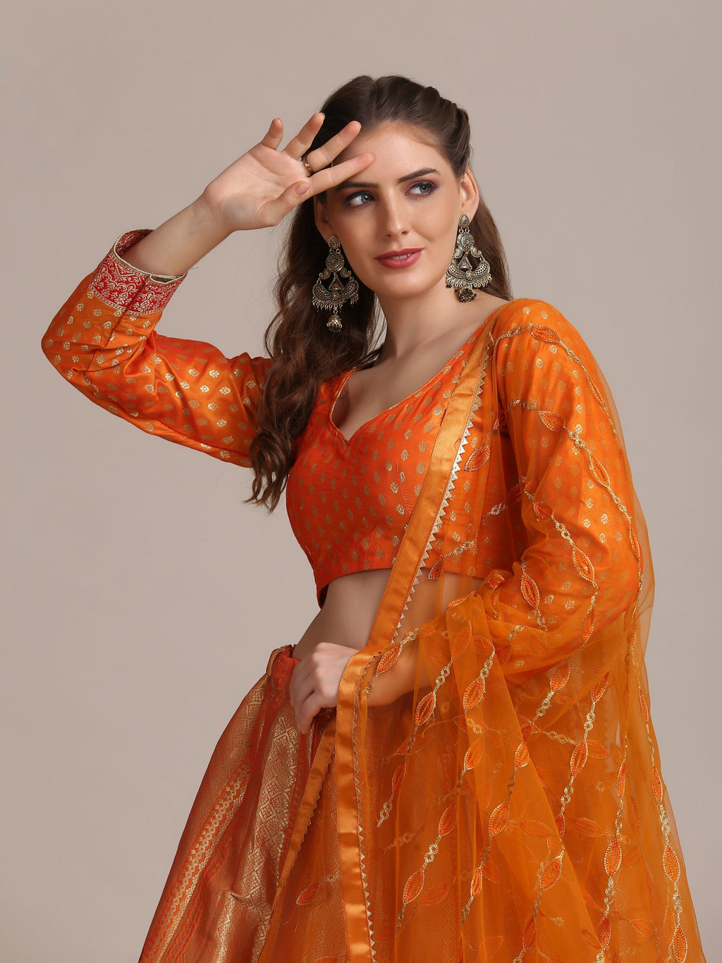 Orange Jacquard Silk Lehenga Choli with Gold Woven Work