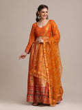 Orange Jacquard Silk lehenga choli with gold woven work and matching dupatta