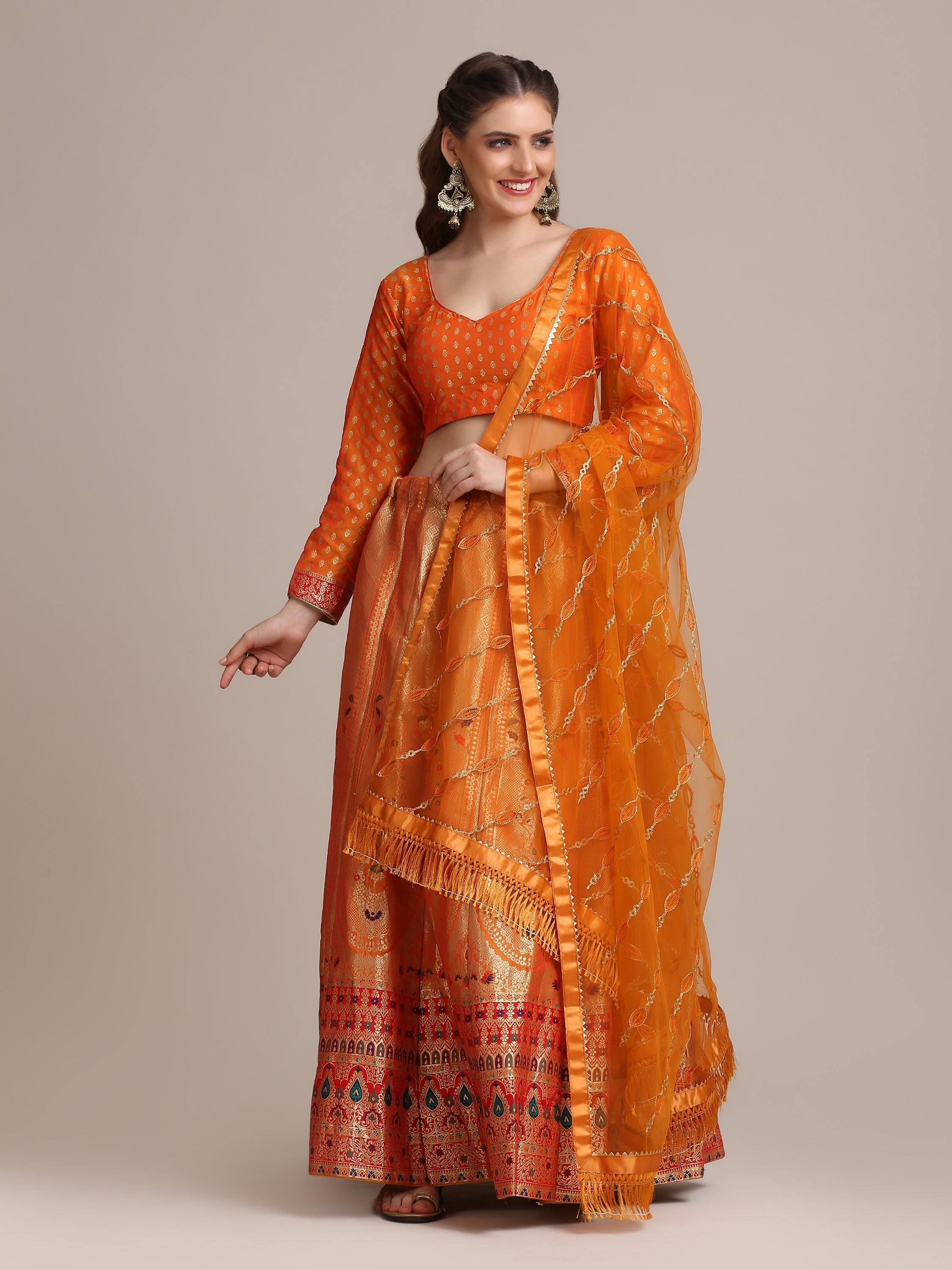 Orange Jacquard Silk lehenga choli with gold woven work and matching dupatta