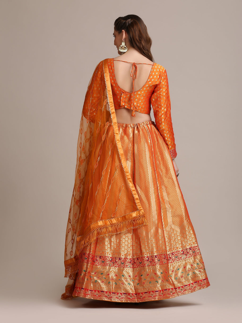 Orange Jacquard Silk Lehenga Choli with Gold Woven Details