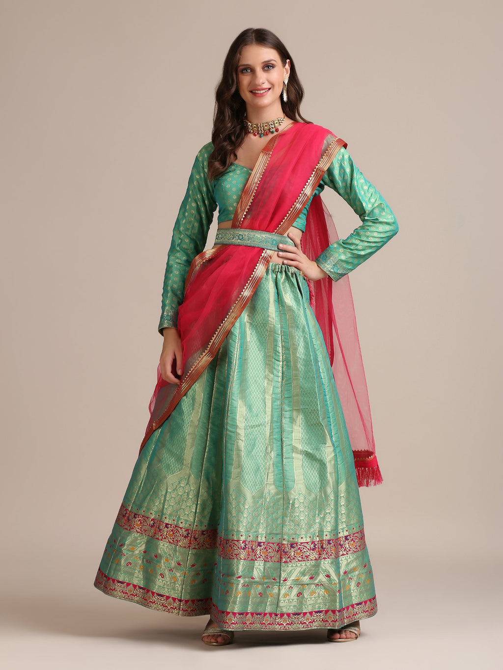 Sea green Jacquard silk lehenga choli with metallic gold woven patterns