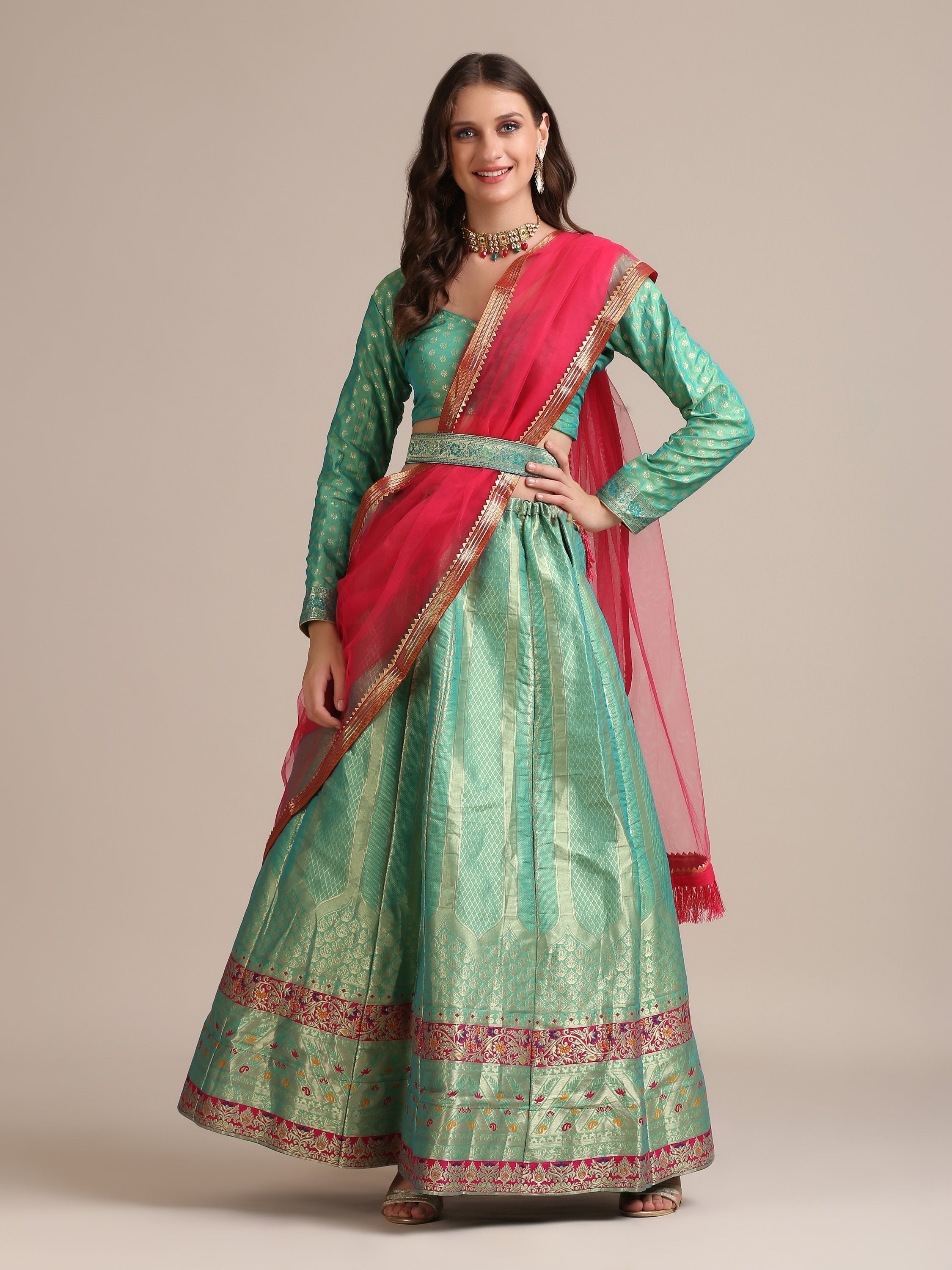 Sea green Jacquard silk lehenga choli with metallic gold woven patterns