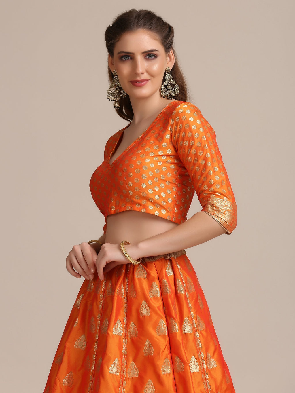 Orange Jacquard Silk Lehenga Choli with Gold Woven Details