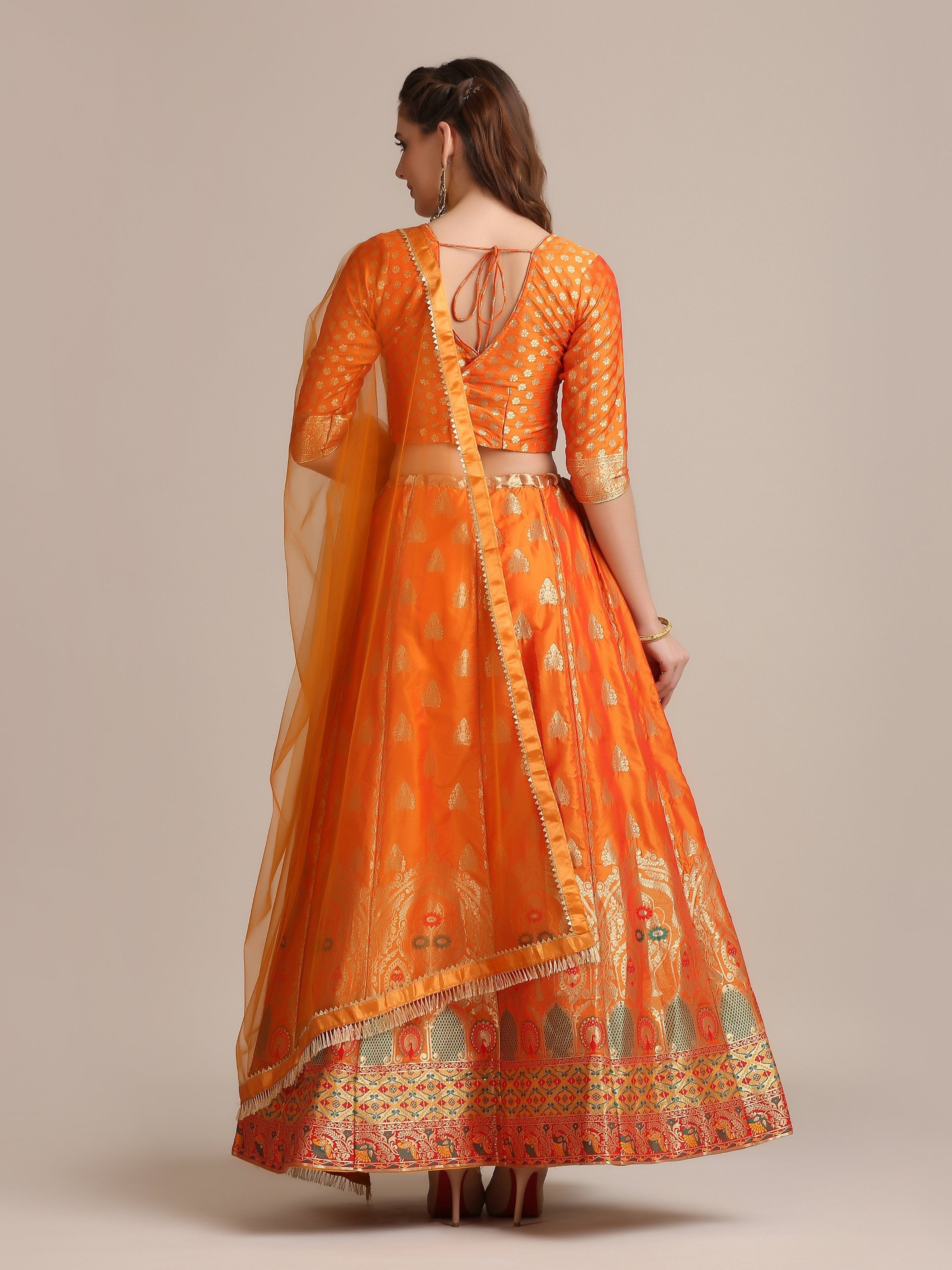 Orange Jacquard Silk Lehenga Choli with Gold Woven Details