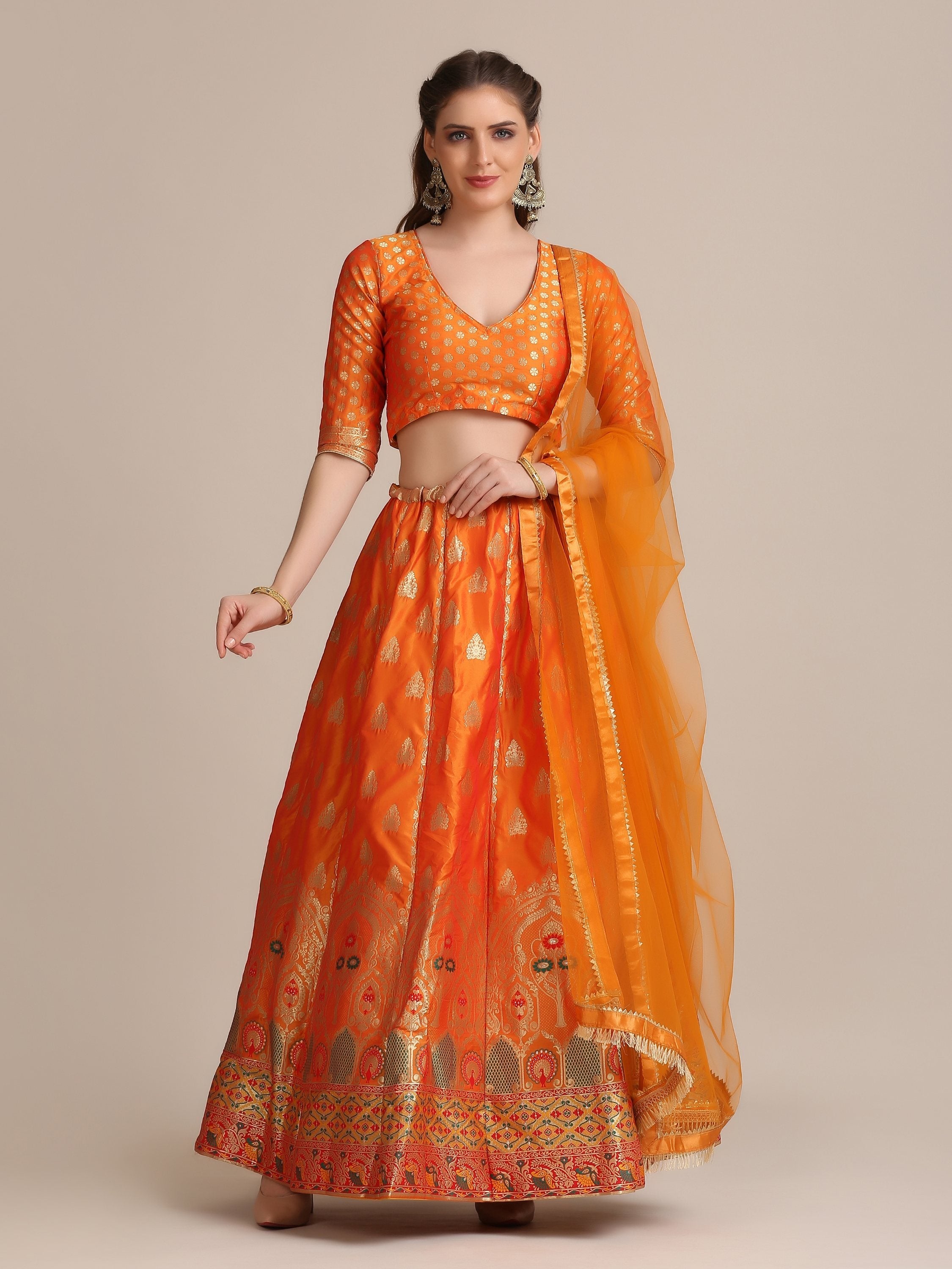 Orange jacquard silk lehenga with gold woven patterns and cancan