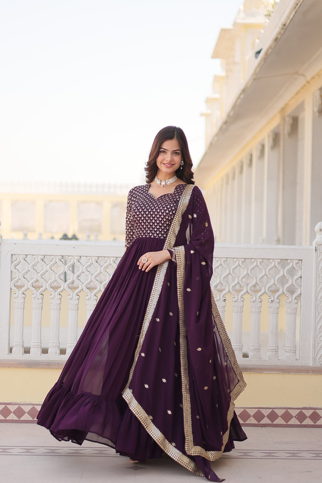 Wine faux blooming Anarkali kurta featuring Zari embroidery and sequin work with matching dupatta