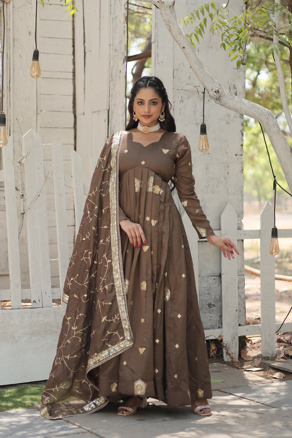 Front view of a brown floor-length Vichitra shimmer Anarkali kurta with sequins and embroidery
