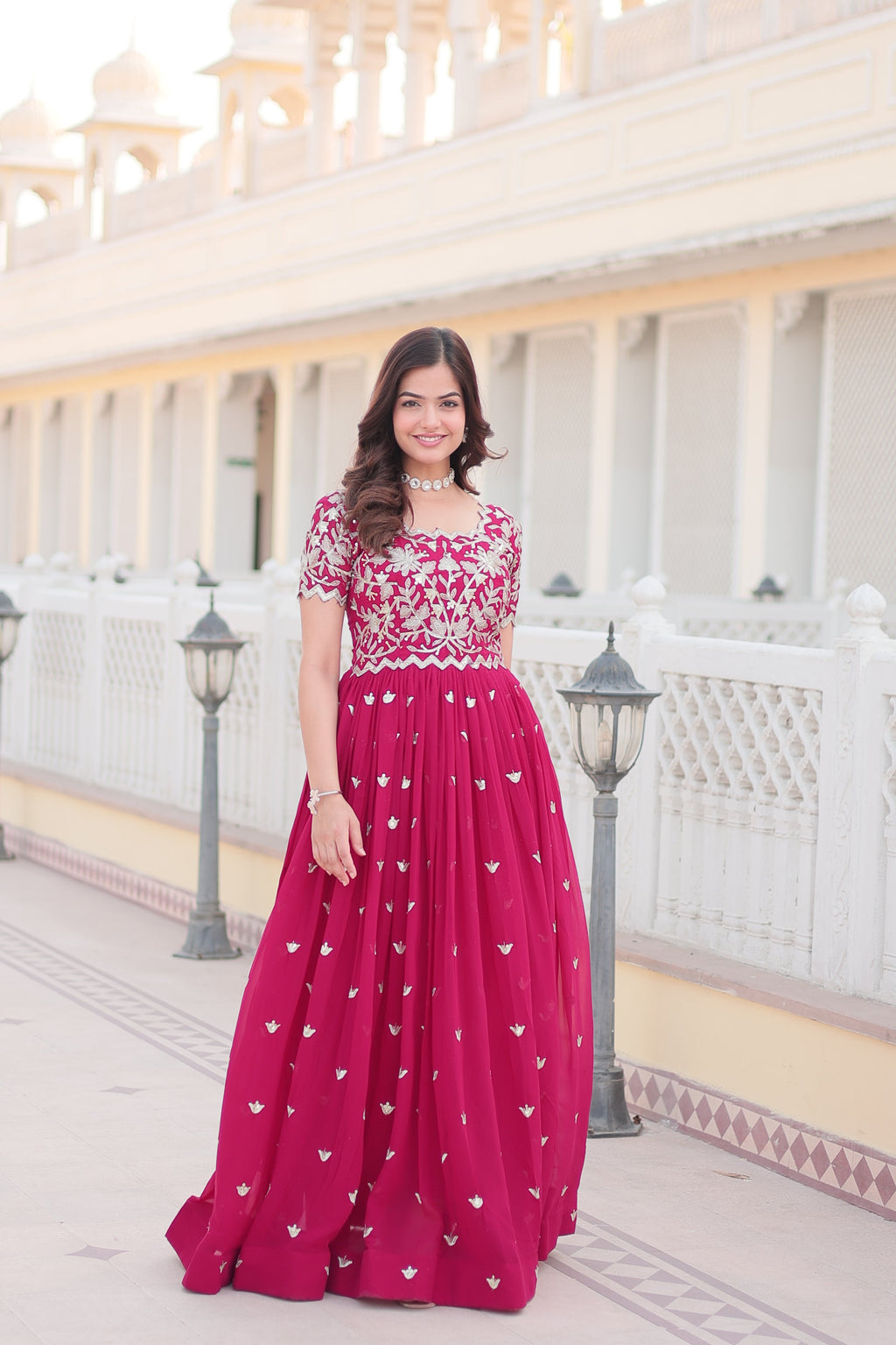 Vibrant Rani Pink Anarkali dress featuring intricate silver codding sequin embroidery.