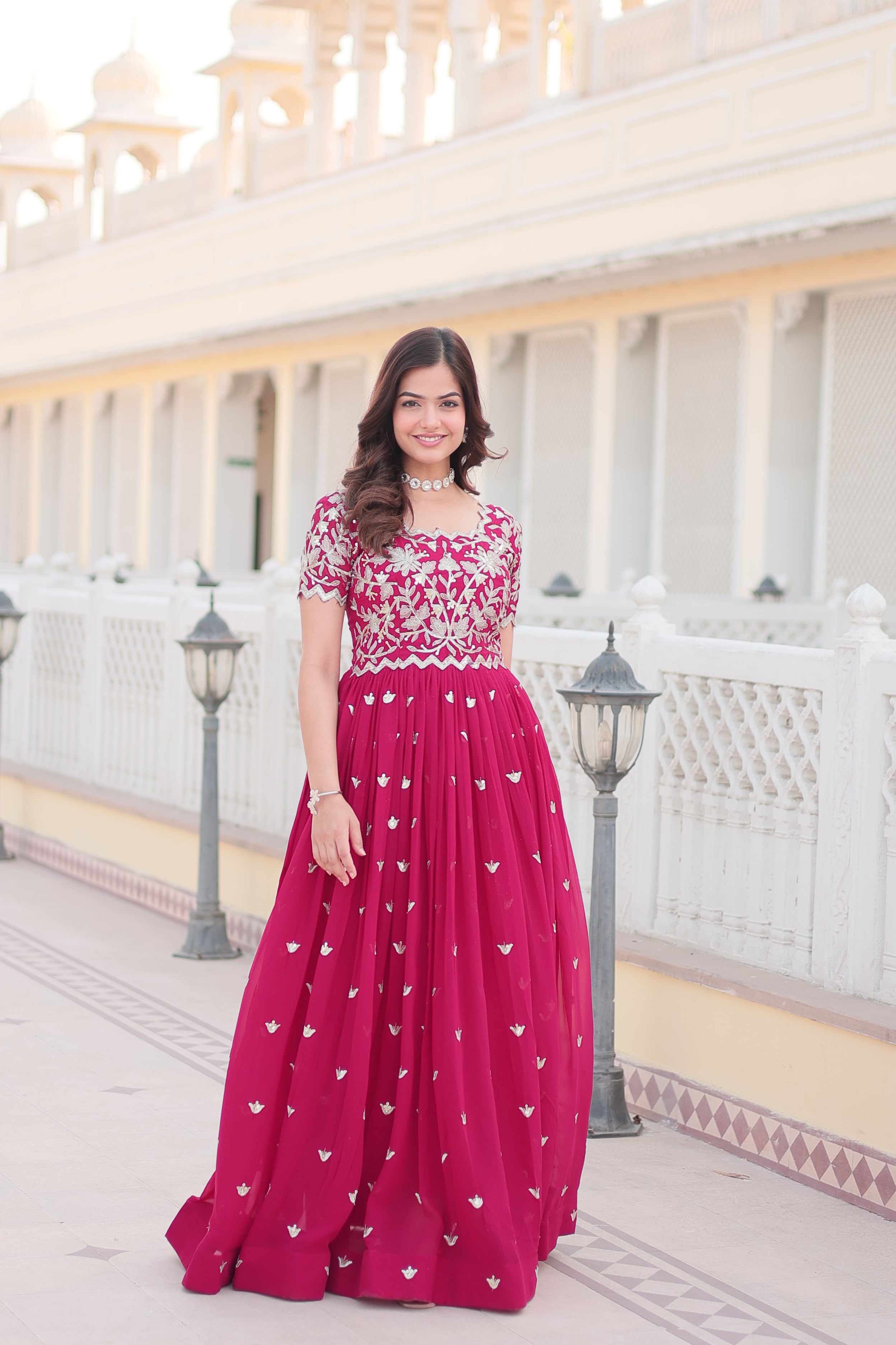 Vibrant Rani Pink Anarkali dress featuring intricate silver codding sequin embroidery.