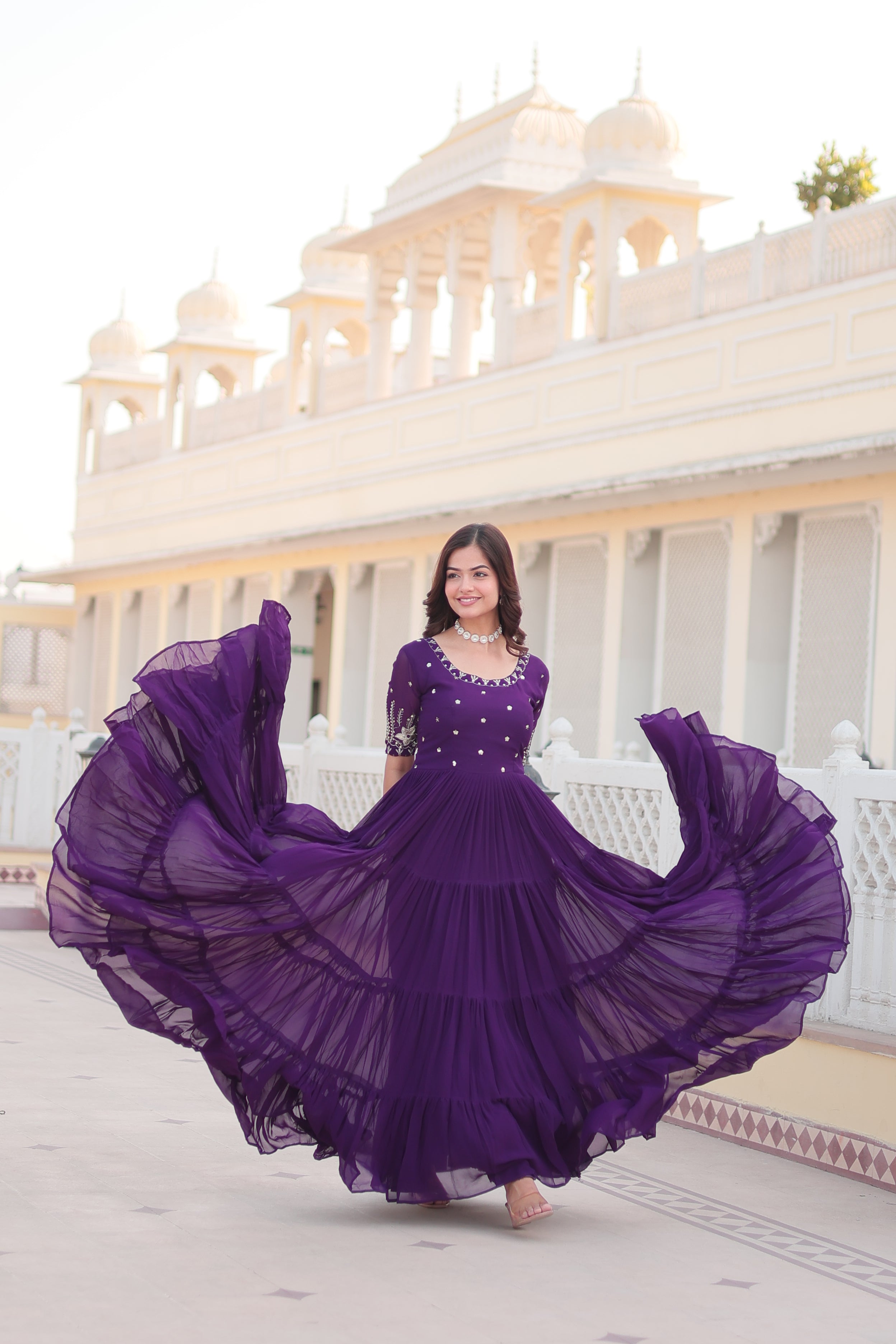 Purple floor-length Anarkali dress with detailed sequins and zari embroidery