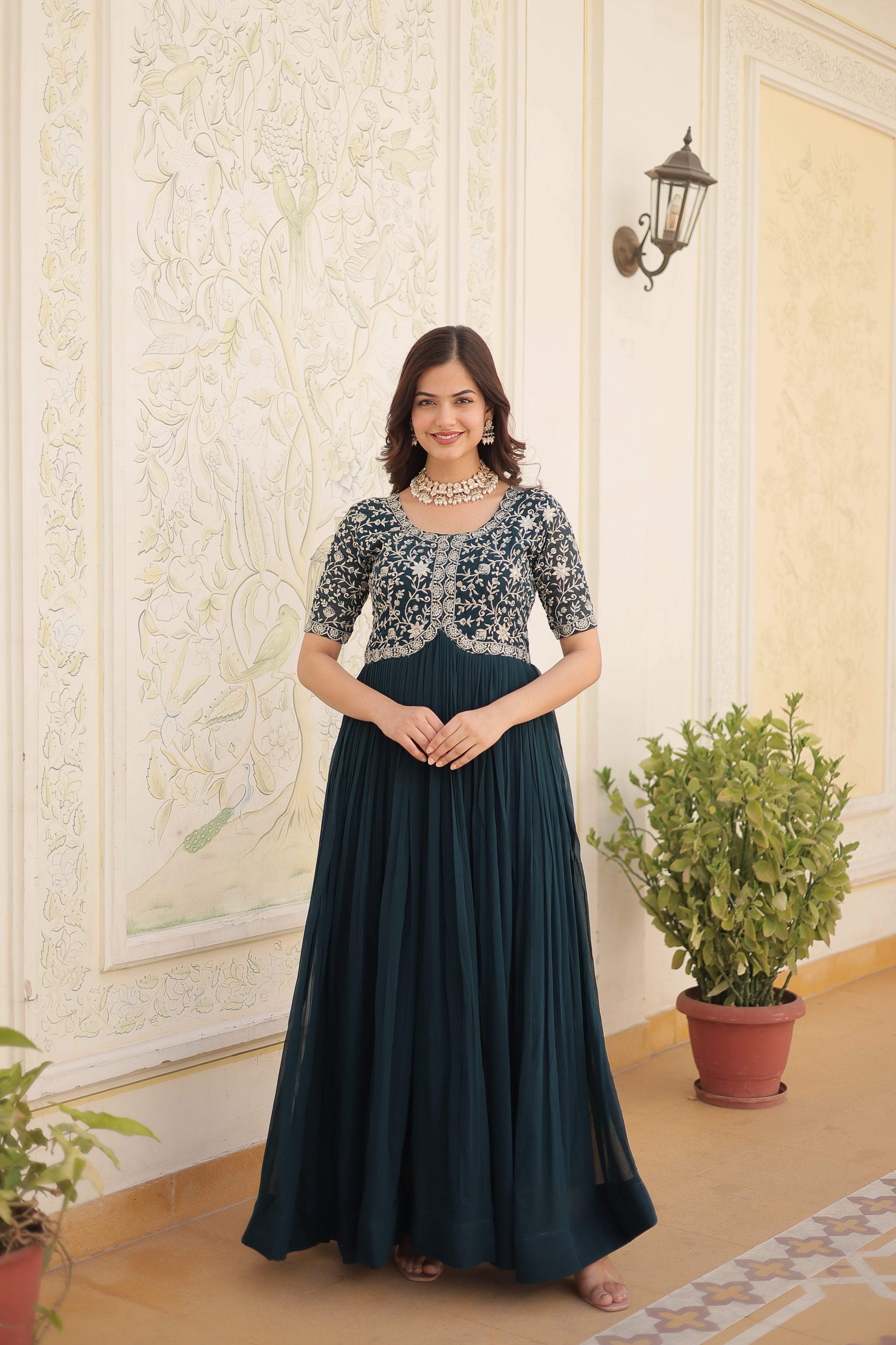 Rama colored floor-length Anarkali dress with gold zari and sequins embroidery